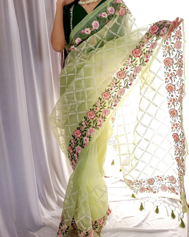 saree attach with latkan and green silk blouse